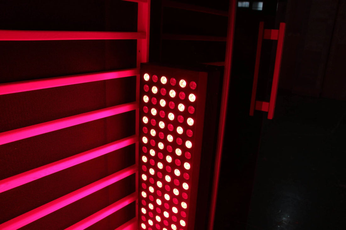 Sun Home Eclipse 2-person red light infrared sauna interior detail of glowing red light LED panel